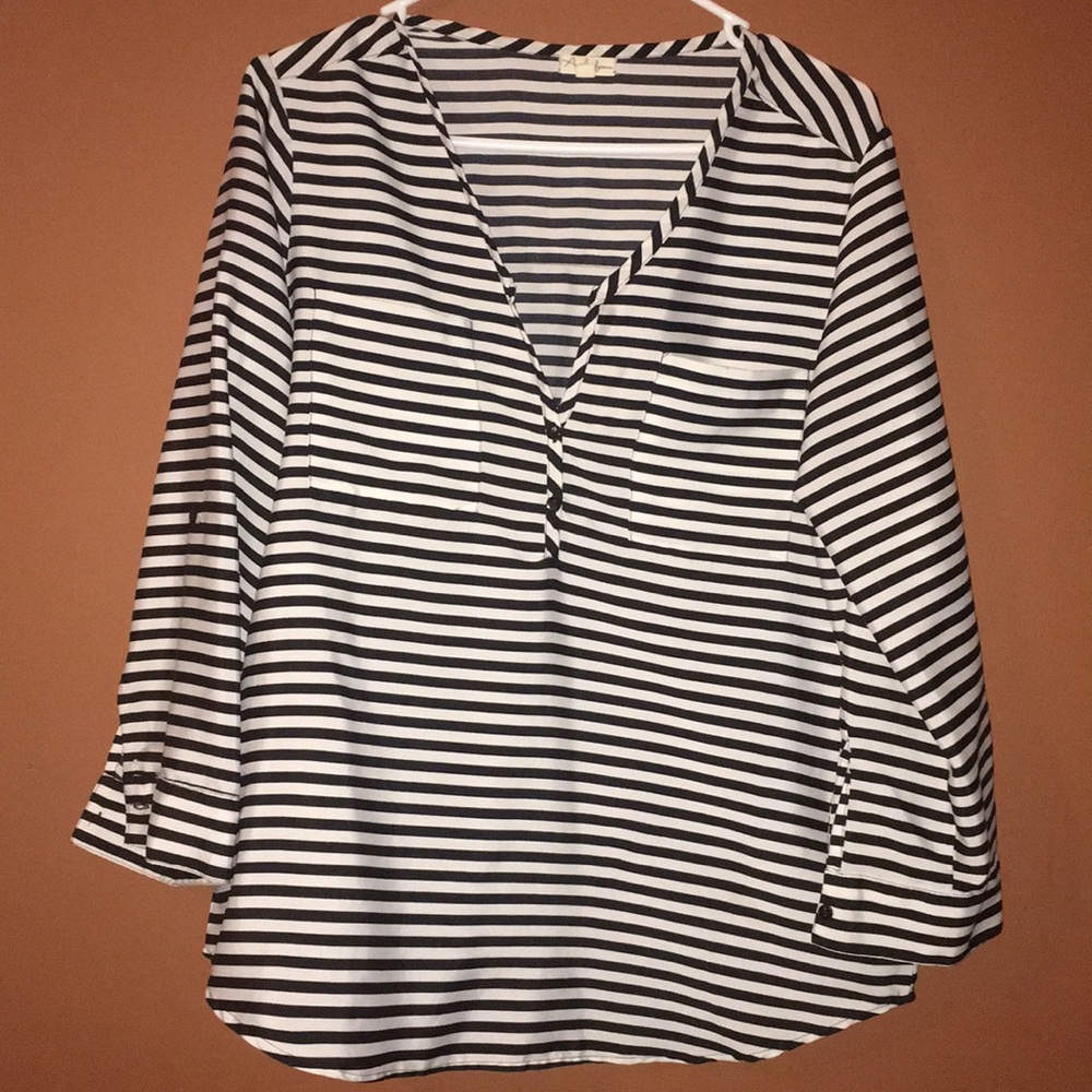 Black and white striped blouse.